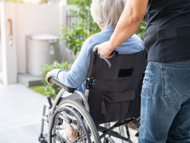 NDIS business owner in Sydney reviewing client management system before sale