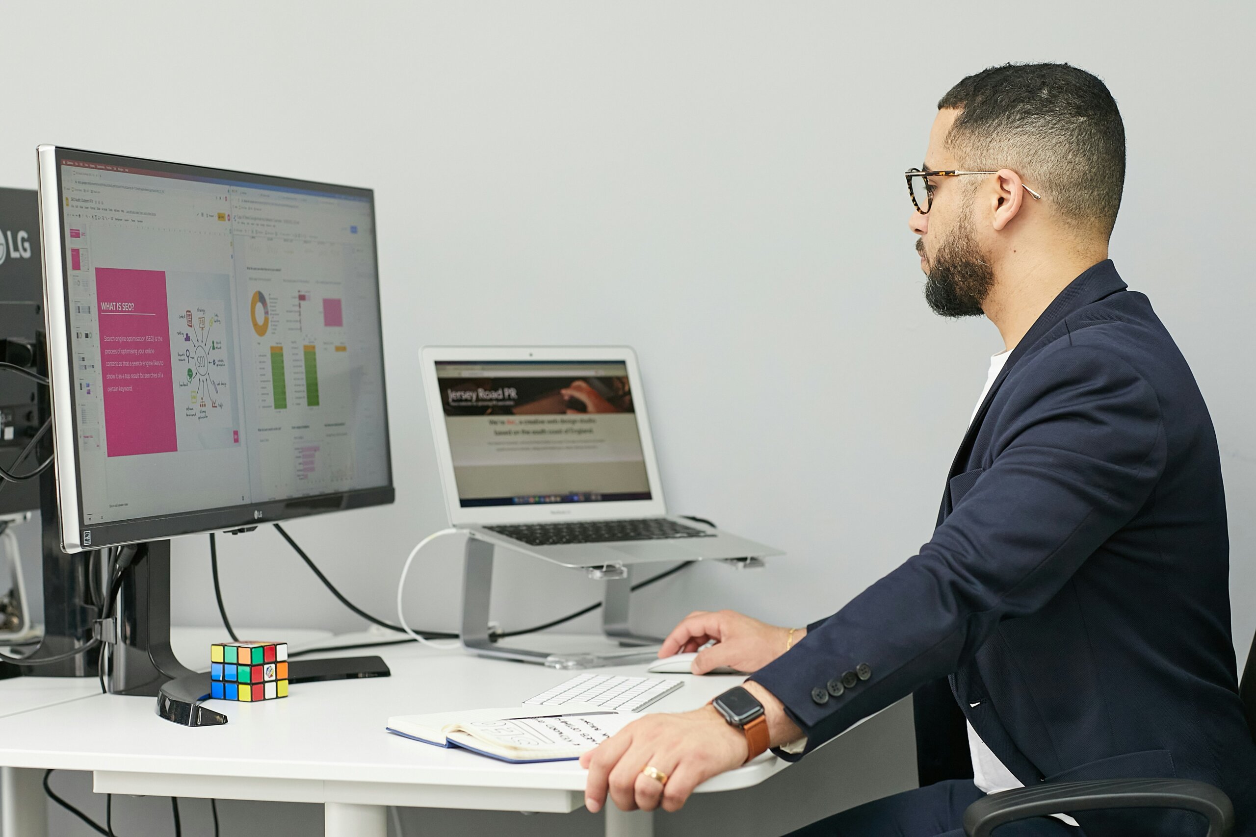 Business owner checking calendar, hesitating on when to sell